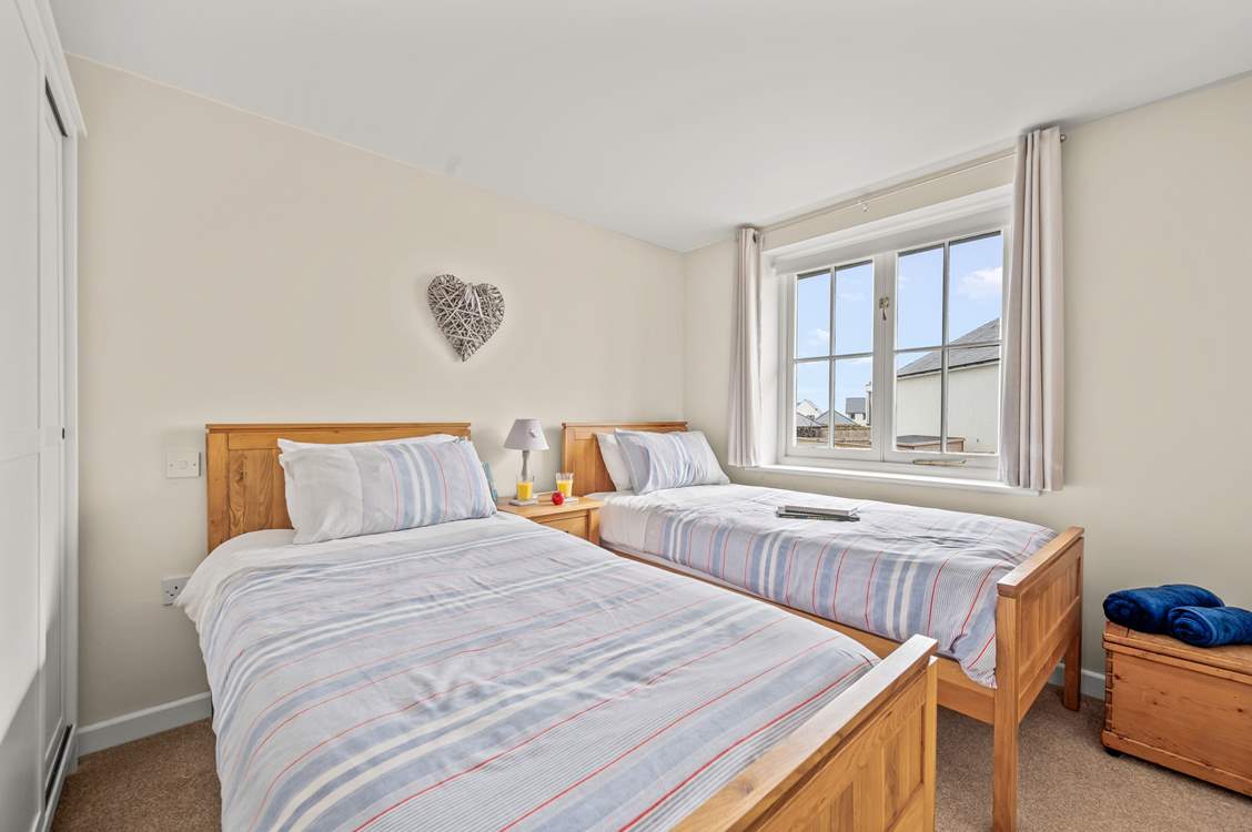 Bedroom 3 is home to this cute twin bed configuration.