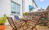 Sitting in the enclosed courtyard is the perfect space to enjoy a good book or touch of dining al fresco. - Thumbnail Image