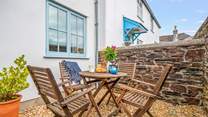 Sitting in the enclosed courtyard is the perfect space to enjoy a good book or touch of dining al fresco.