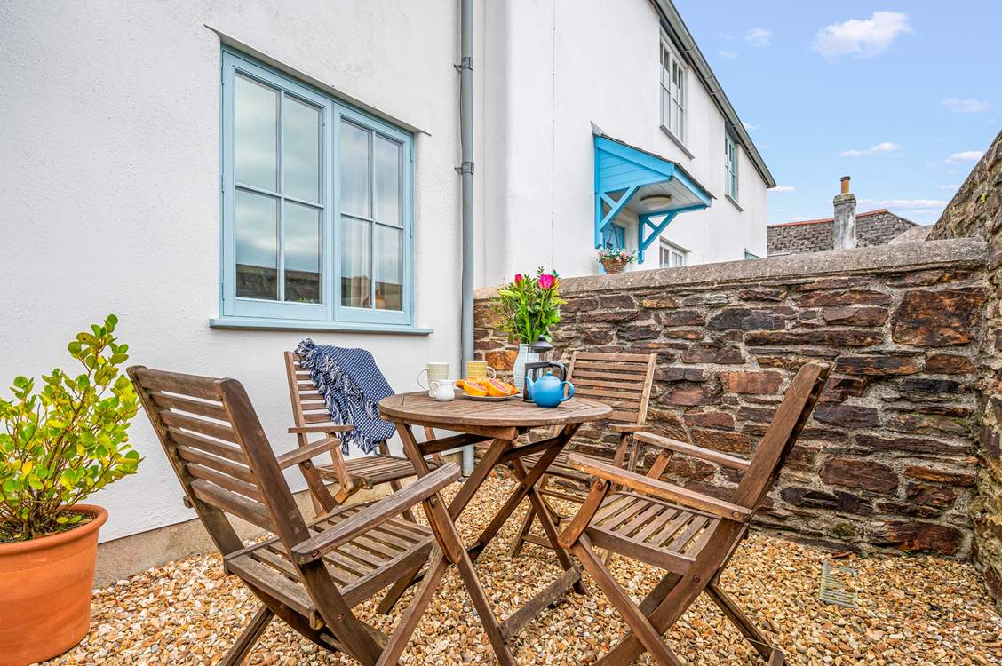 Sitting in the enclosed courtyard is the perfect space to enjoy a good book or touch of dining al fresco.