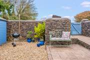 As you enter the back courtyard area, you are greeted with oodles of space and a lovely area to enjoy a good book.