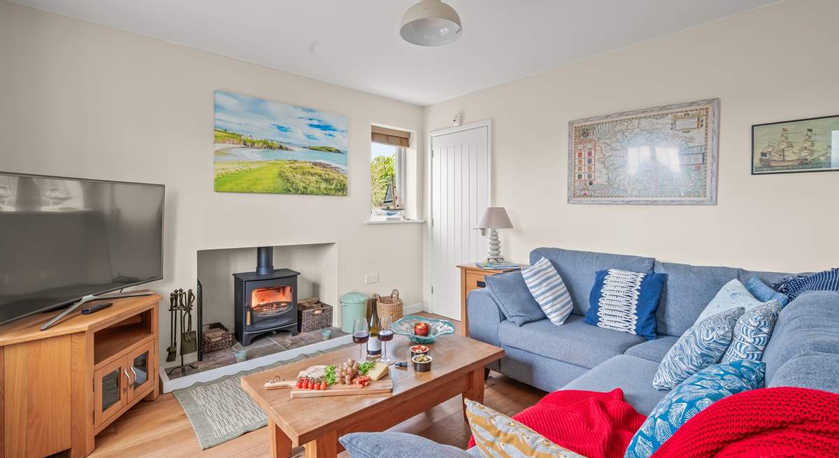 The living-room boasts a large Smart TV. Perfect for those movie nights cuddled up in front of the wood-burner.