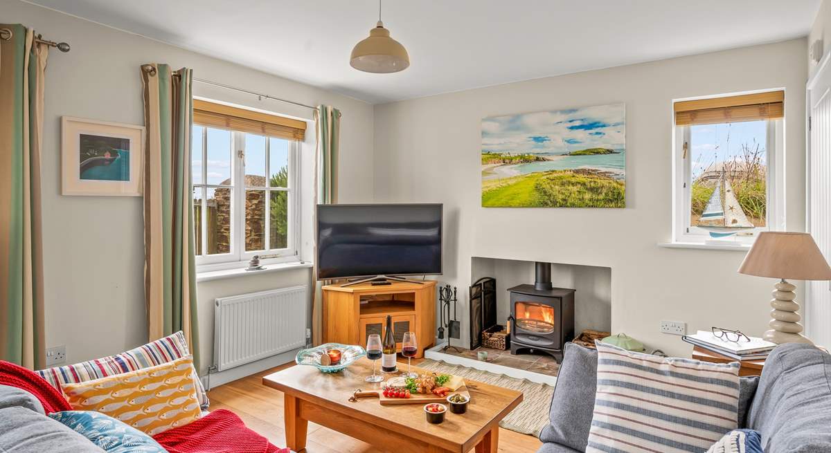 The cosy living-room area is the perfect place to snuggle up after a day exploring the glorious South Hams.