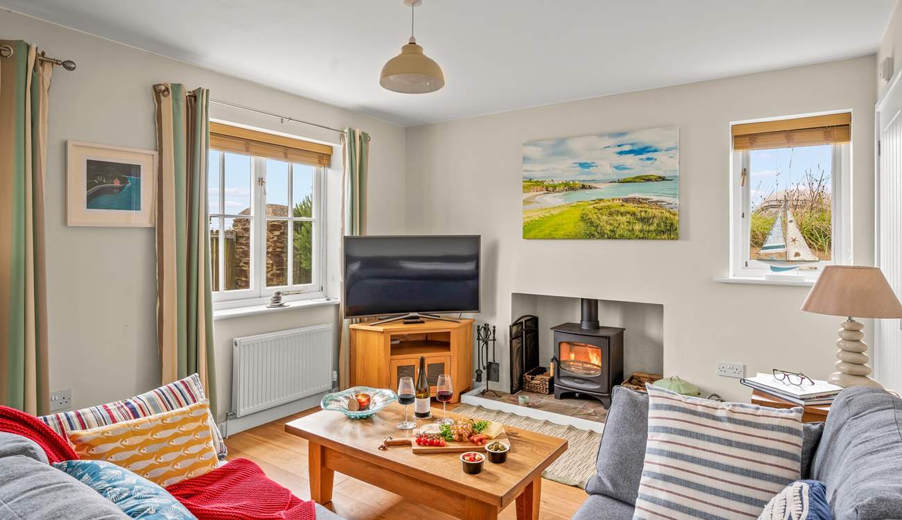 The cosy living-room area is the perfect place to snuggle up after a day exploring the glorious South Hams.