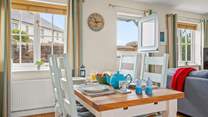 Enjoying any meal at this dining-table is a pleasure. Especially as you can fling the top stable-door open and enjoy the great outdoors from the comfort of the dining-area.