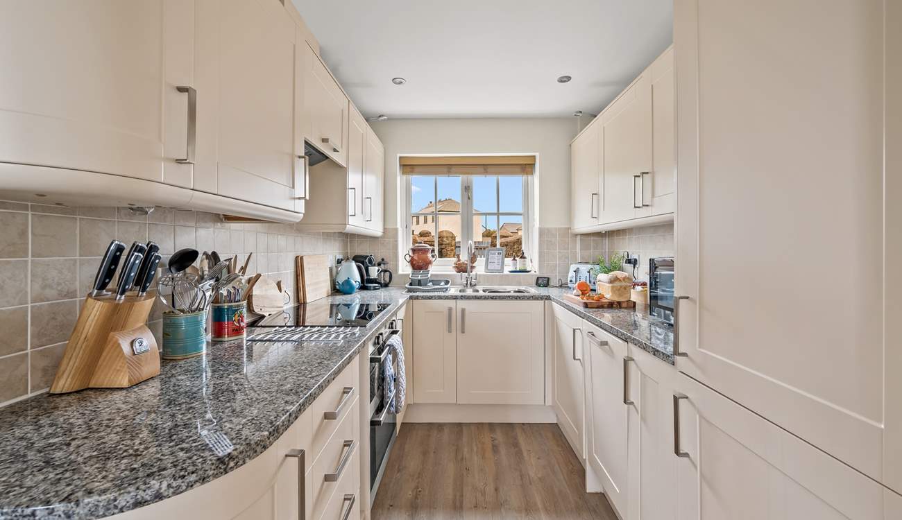 The fully equipped kitchen holds everything the chef of the party needs and more.