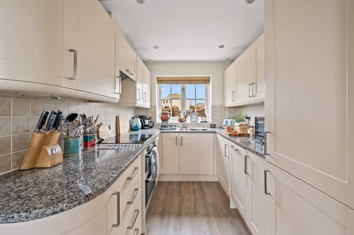 The fully equipped kitchen holds everything the chef of the party needs and more.