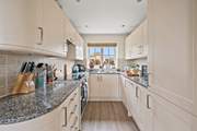 The fully equipped kitchen holds everything the chef of the party needs and more.
