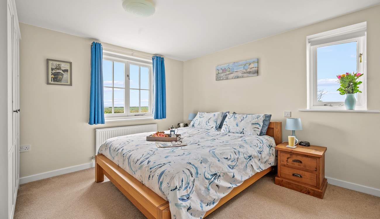 Bedroom 2 is home to this super inviting king-size bed.