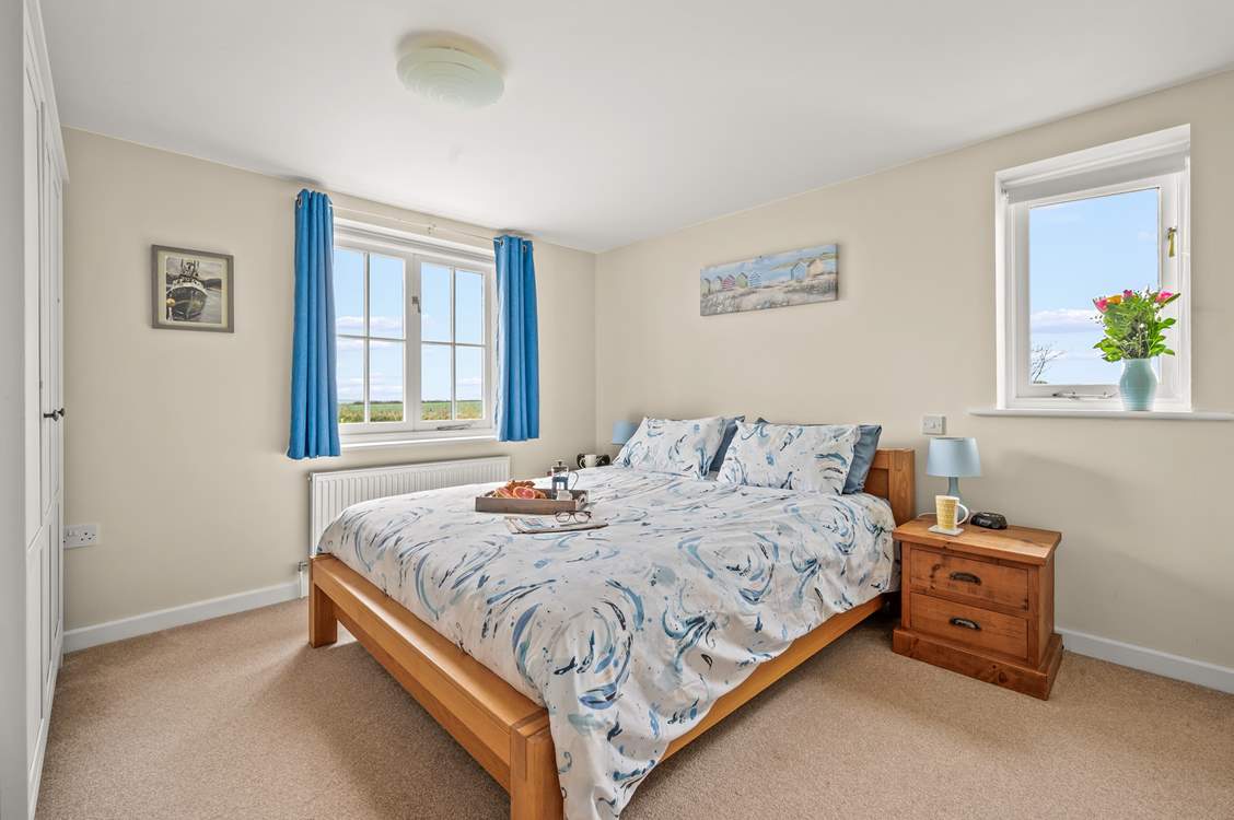 Bedroom 2 is home to this super inviting king-size bed.