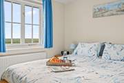 Bedroom 2 has far reaching views over the countryside.