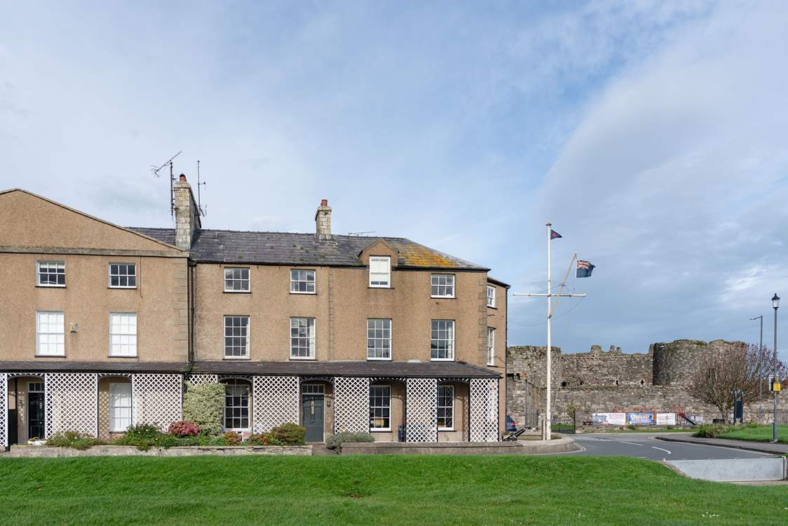 Steeped in history and elegance, this terraced property is nestled in a prime location on the sea front in Beaumaris, near the castle.