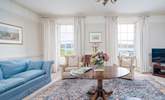 Calming, pretty blue hues marry perfectly with sea views in the elegant sitting-room.  - Thumbnail Image