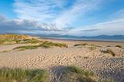 Beautiful Newborough beach is well worth a visit.