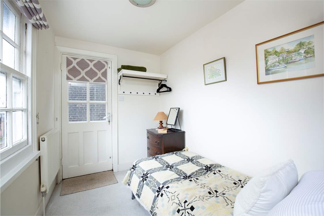 The door leads out to the roof terrace.