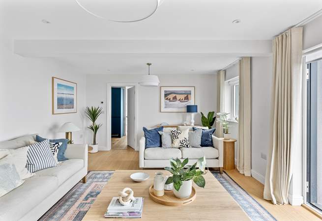 Coastal tones are the order of the day in the sitting-room.