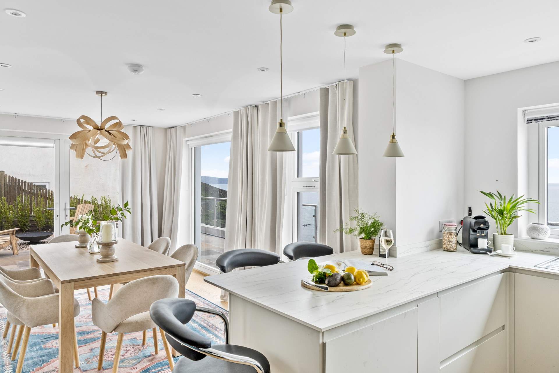 The kitchen/dining-room leads off from the sitting-room.