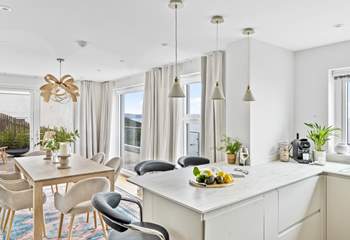 The kitchen/dining-room leads off from the sitting-room.