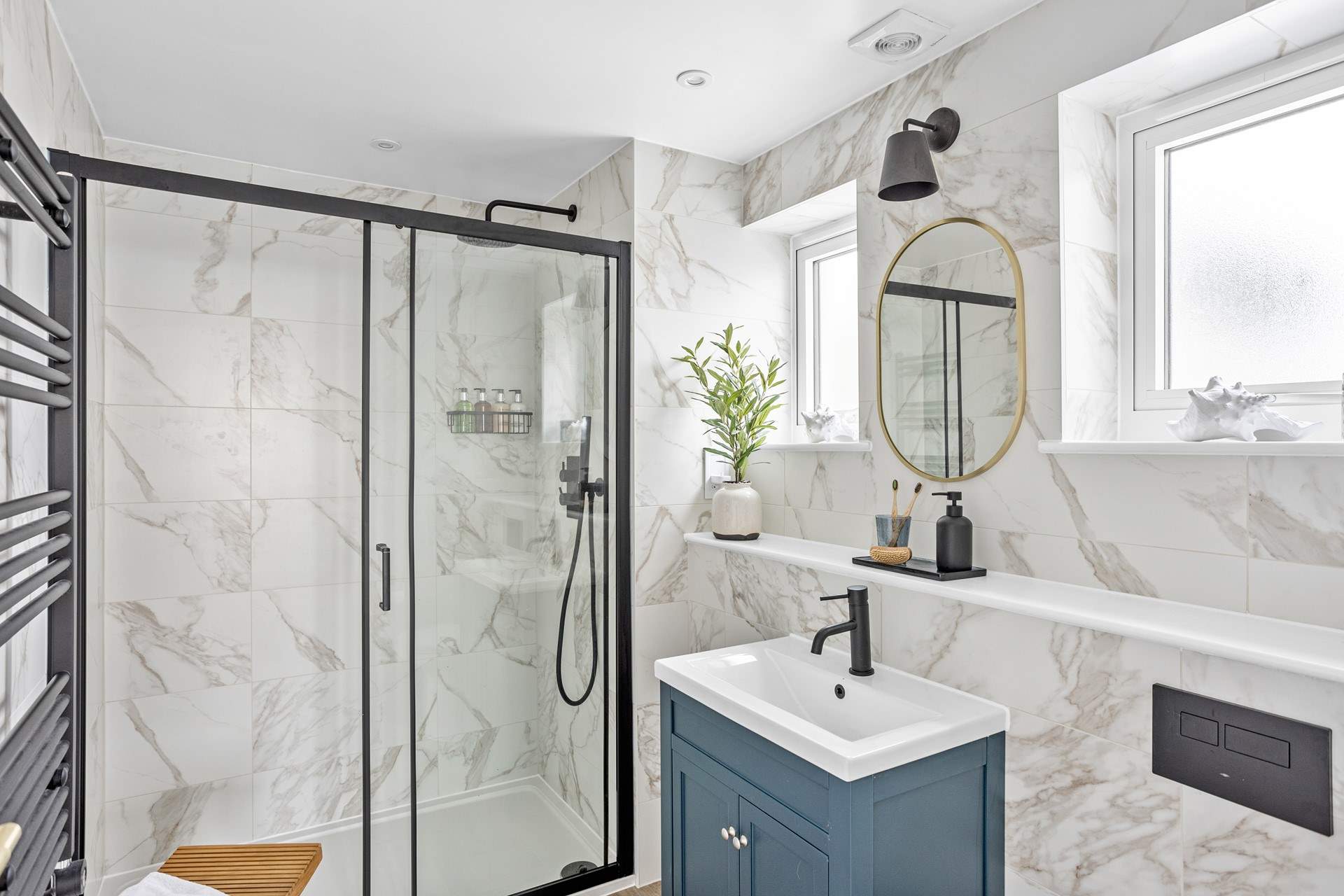 Bedroom 1's stylish en suite shower-room.