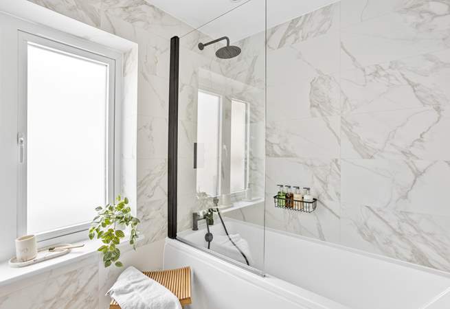 The en suite in bedroom 3 has the luxury of a bath and shower, perfect for leisurely soaks or a quick wake up shower.