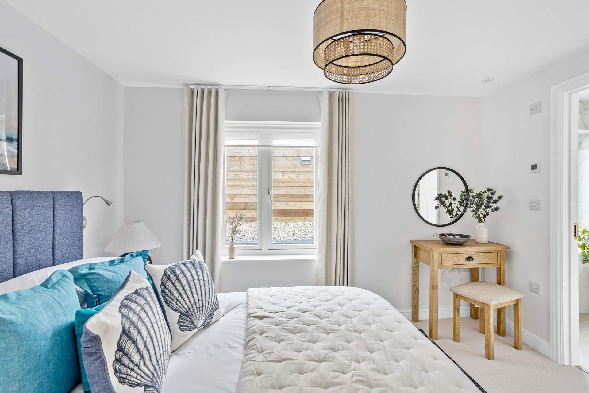 The coastal themed interiors continue in bedroom 3.