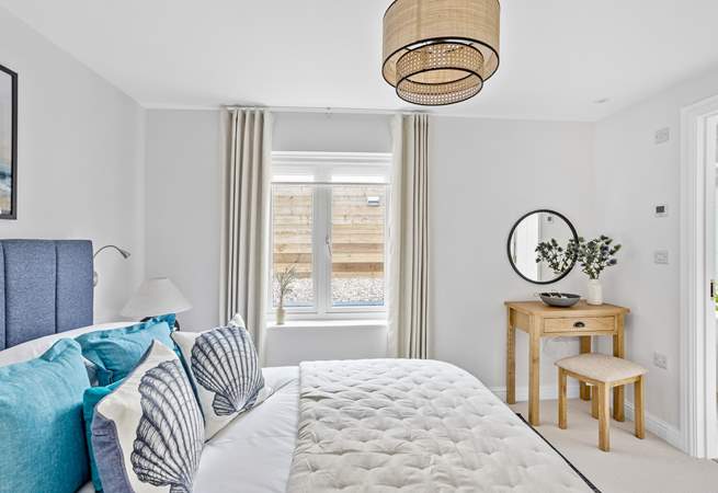 The coastal themed interiors continue in bedroom 3.