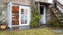 The patio door from the kitchen opens out to reveal the views.