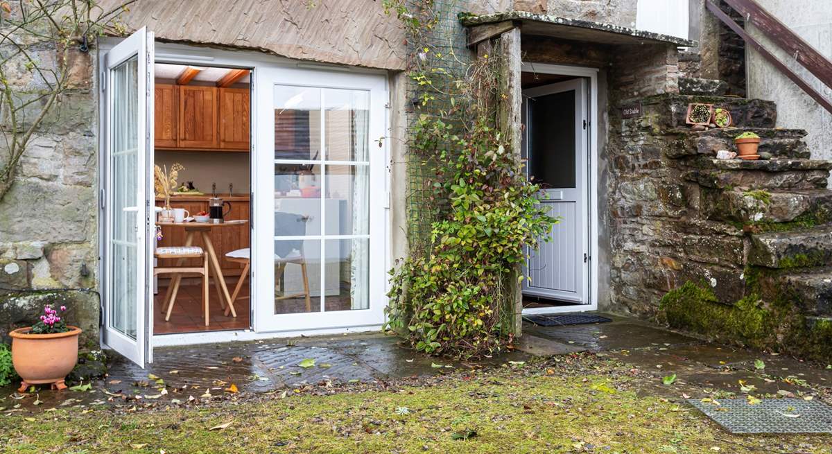 The patio door from the kitchen opens out to reveal the views.