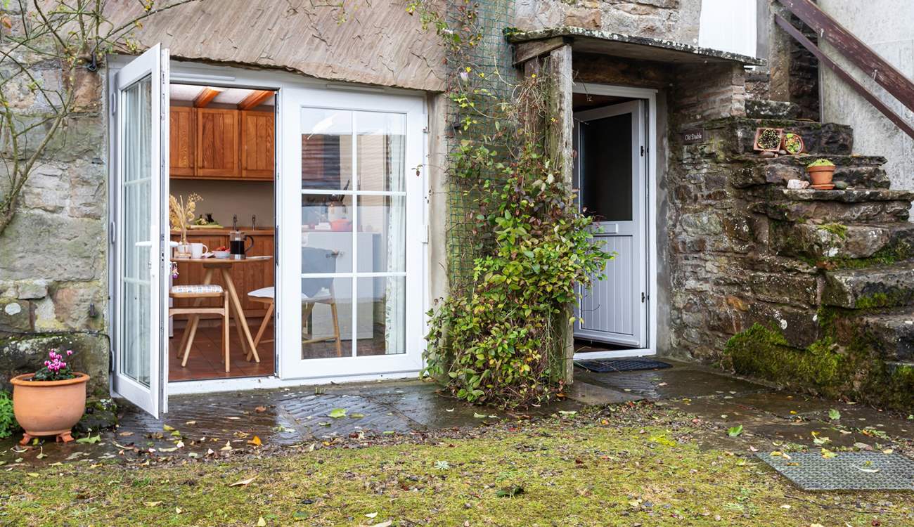 The patio door from the kitchen opens out to reveal the views.