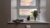 Even the modern bath has a view from the window and don't you love those wide window sills.