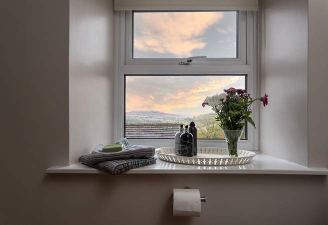 Even the modern bath has a view from the window and don't you love those wide window sills.