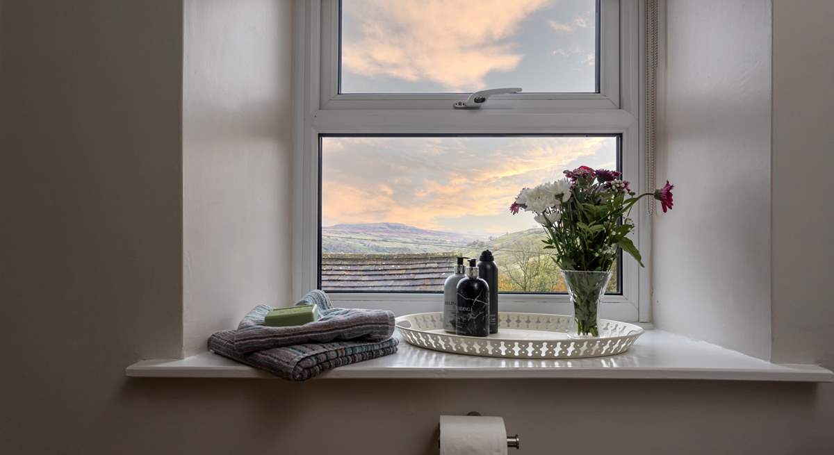 Even the modern bath has a view from the window and don't you love those wide window sills.