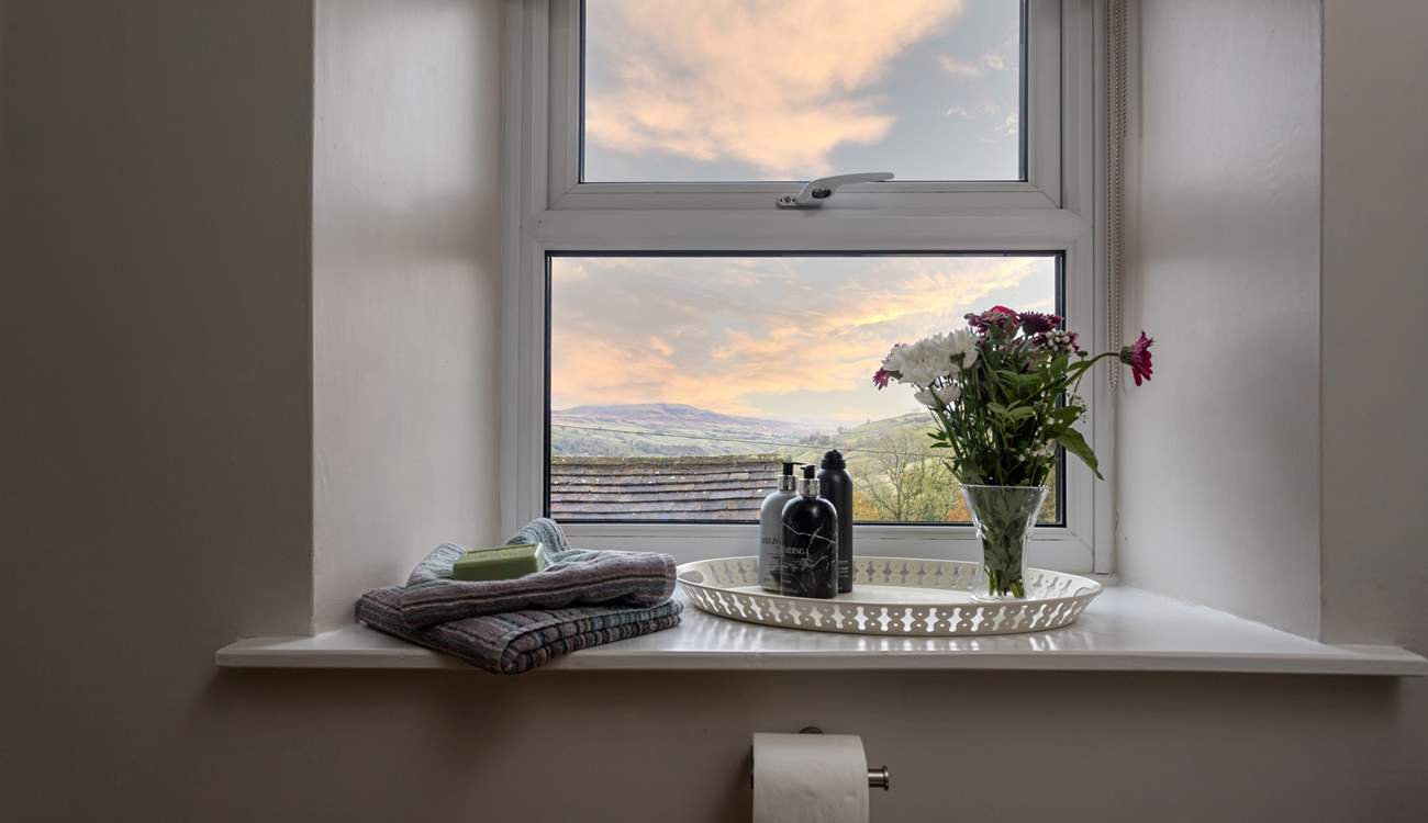 Even the modern bath has a view from the window and don't you love those wide window sills.