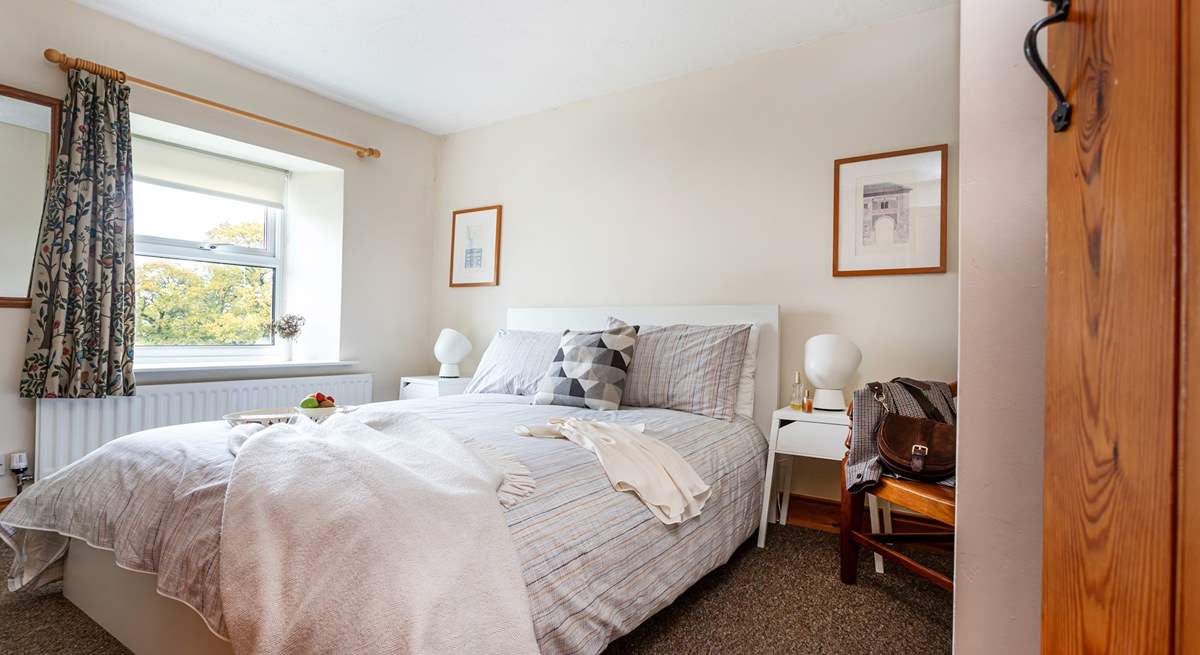 A lovely country-style bedroom to retire to.