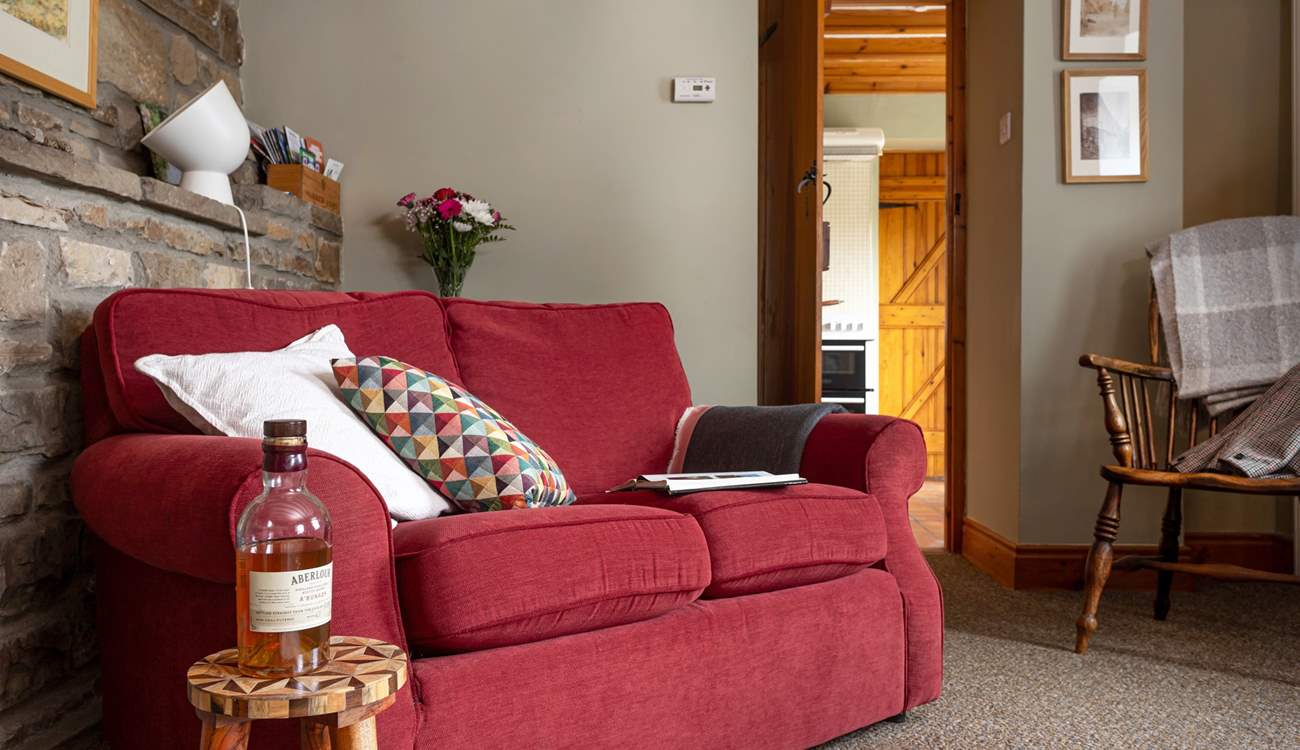 Whether planning for the next day or recovering from the day's adventures, relax on this comfortable sofa.