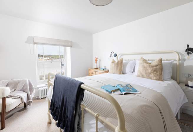 Welcome to Basil Cottage.
On the second floor you will discover bedroom one with estuary views to delight.