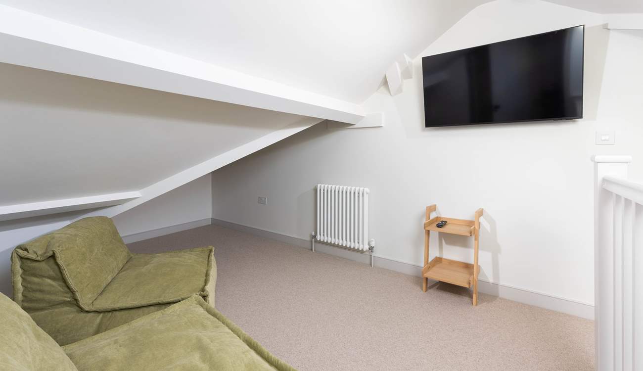 Lastly, climb the last set of stairs up to the third floor where you will discover the perfect hangout room for watching a film or rugby match.  Being in the loft you will have to watch the sloping ceilings.