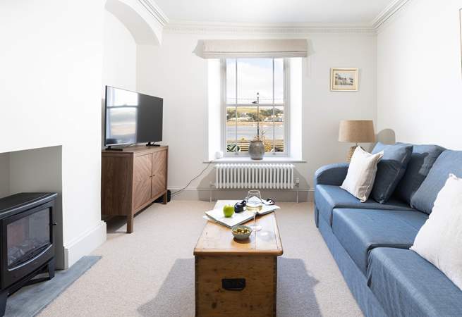 Head up to the first floor and relax in the sitting-room whilst taking in the view.