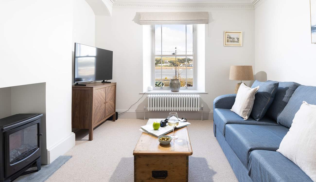 Head up to the first floor and relax in the sitting-room whilst taking in the view.