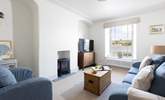 The sitting-room offers the perfect setting to sit back and relax into a holiday by the sea. - Thumbnail Image