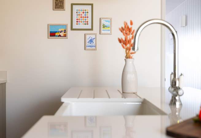 Head back out to the front of the house to find the stairs in the dining-area.