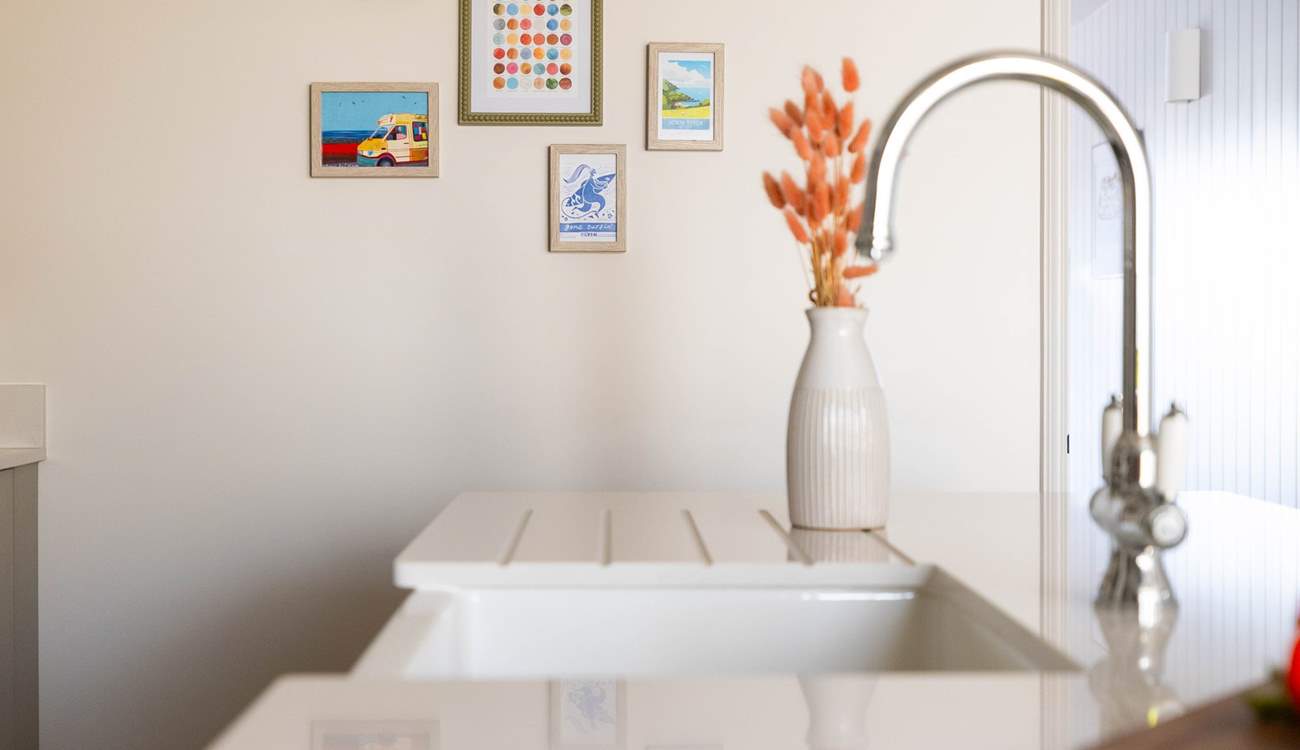 Head back out to the front of the house to find the stairs in the dining-area.