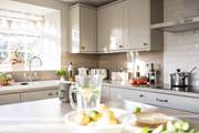 The island is perfect to perch by and watch the chef at work.