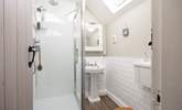 En suite shower-room with shower, WC and wash-basin to bedroom 1, calming and inviting.  - Thumbnail Image