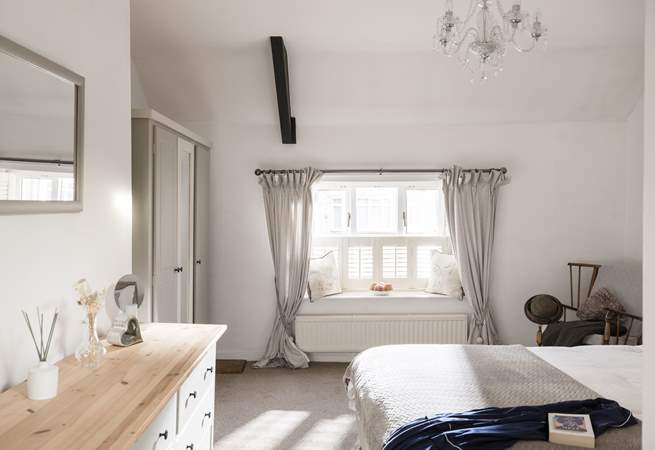 The main bedroom has a king-size double bed and a stylish en suite, relax in style. 