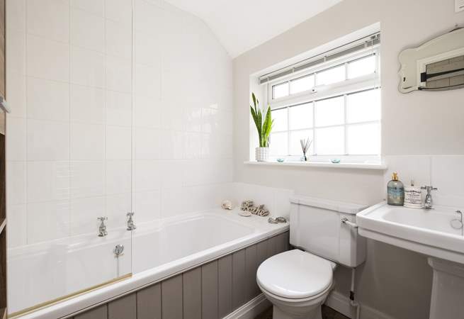 The bathroom has a bath for long, lazy soaks with a shower over for a quick energising refresh. 