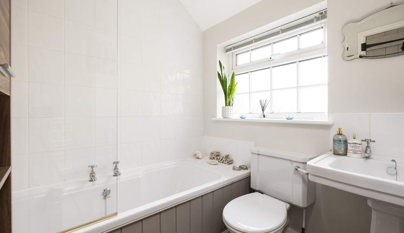 The bathroom has a bath for long, lazy soaks with a shower over for a quick energising refresh. 