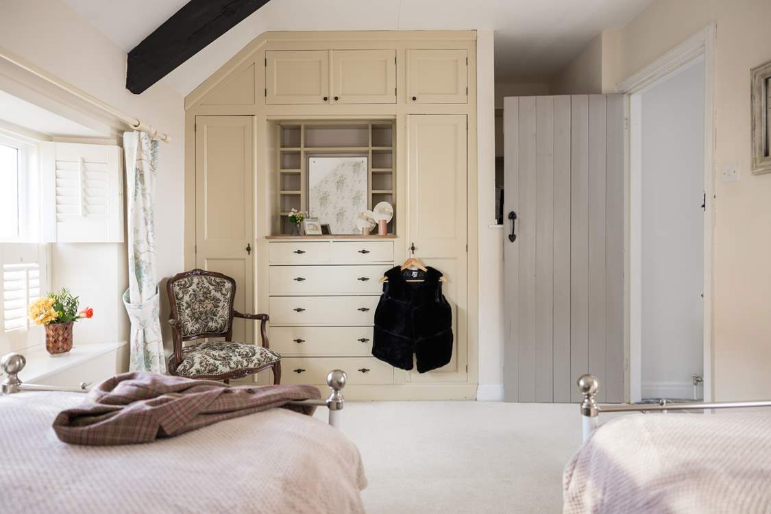Getting ready for a day at the coast is a dream in the twin bedroom.