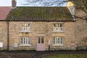 Pretty as a picture and Grade II Listed too.