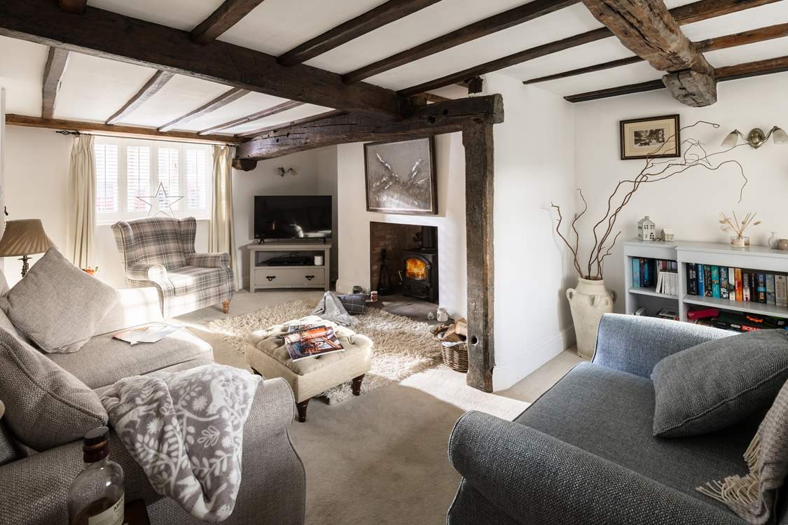 The sitting-room is stylish and cosy.